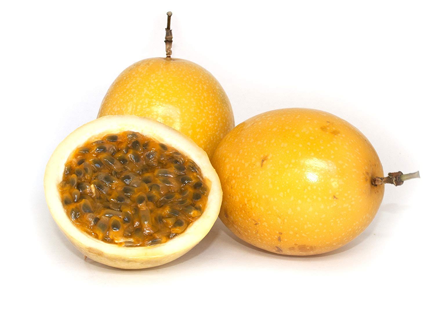Yellow passion fruit variety grown in Kenya showing bright golden yellow skin and oval shape, harvested from tropical lowland farms