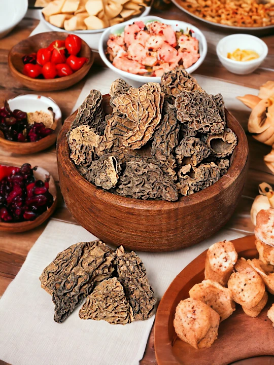 Dried gucchi mushrooms in bowl showing honeycomb texture used in gourmet cooking soups risotto and traditional Himalayan medicine