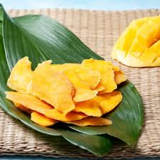 Philippine Brand dried green mango slices packaged for export showing tart sweet product Carabao variety Cebu Philippines